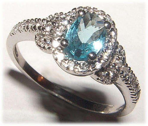 CHECKERBOARD TOPAZ AND DIAMOND SIMULANT STERLING SILVER RHODIUM FINISH RING.