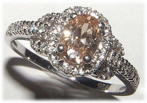 CITRINE AND CZ STERLING SILVER RING.