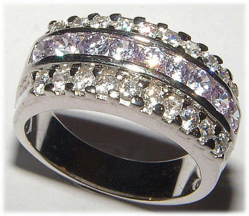 WHITE CZ STERLING SILVER RING.