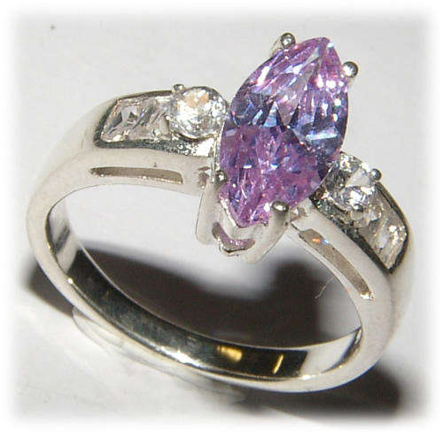 LAVENDER CZ STERLING SILVER RING.