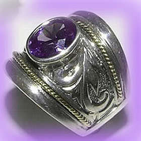 EXTRAORDINARY ITEM! - TANZANITE 9kt GOLD AND STERLING SILVER RING.