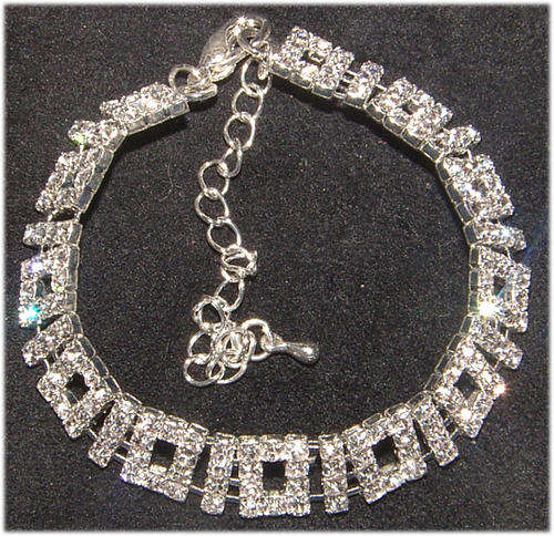 ***NEW AND STUNNING!!***GLAMOUR AND GLITZ  WHITE RHINESTONE BRACELET!!