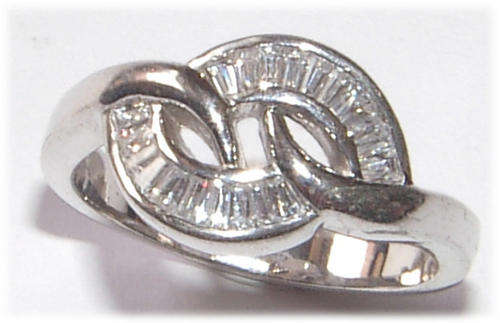 WHITE CZ STERLING SILVER RING.