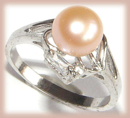 EXTRAORDINARY ITEM! - GENUINE  PEARL  AND DIAMOND SIMULANTS STERLING SILVER RING.