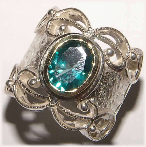 EXTRAORDINARY DESIGNER ITEM! - PARAIBA TOPAZ 9kt GOLD AND STERLING SILVER RING.