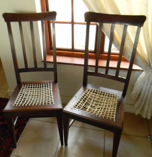 Stunning Pair of Solid Mahogany Edwardian Riempies Chairs - Riempies need to be redone.