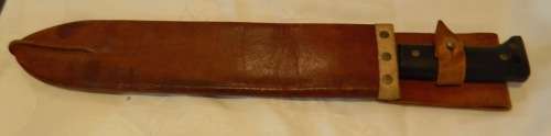 An original WWII US made Legitimus Collins & Co Machete dated 1940 with 1942 Scabbard