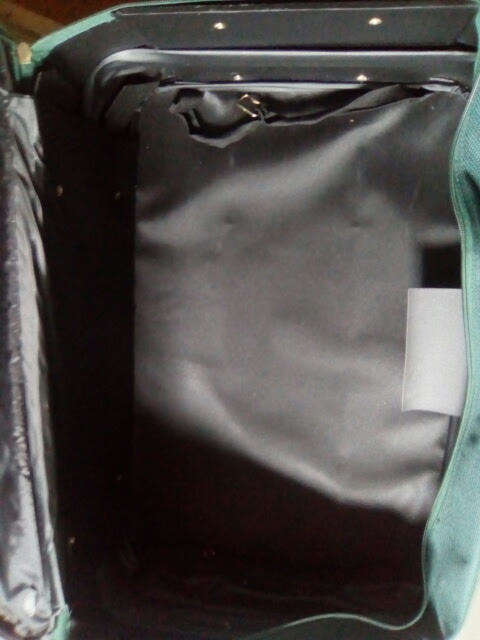 Green Duigui suit case on wheels