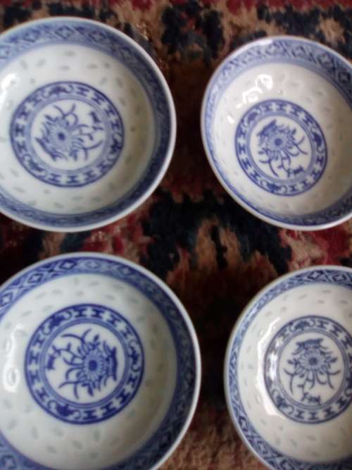 11 of 6 cm porcelain  bowls and 11 rice spoons