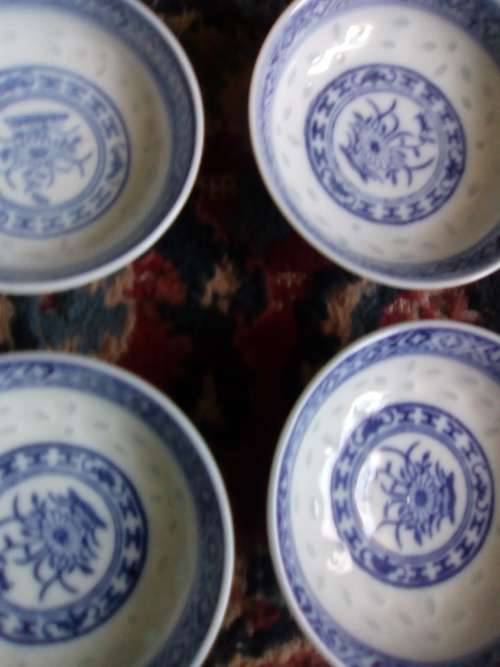 11 of 6 cm porcelain  bowls and 11 rice spoons