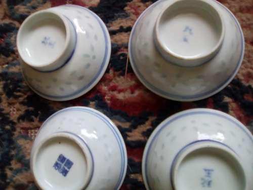 11 of 6 cm porcelain  bowls and 11 rice spoons