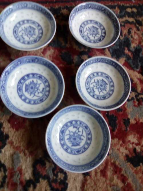 11 of 6 cm porcelain  bowls and 11 rice spoons