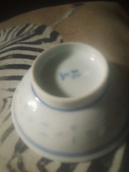 11 of 6 cm porcelain  bowls and 11 rice spoons