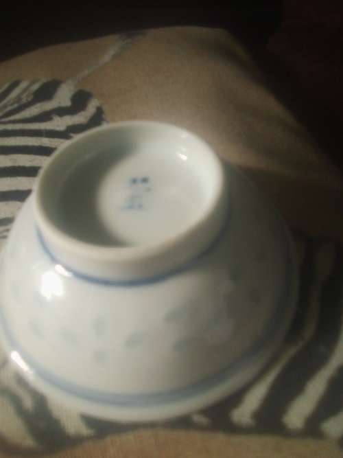 11 of 6 cm porcelain  bowls and 11 rice spoons