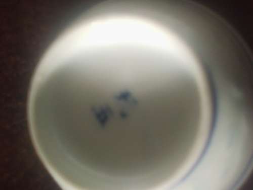 11 of 6 cm porcelain  bowls and 11 rice spoons