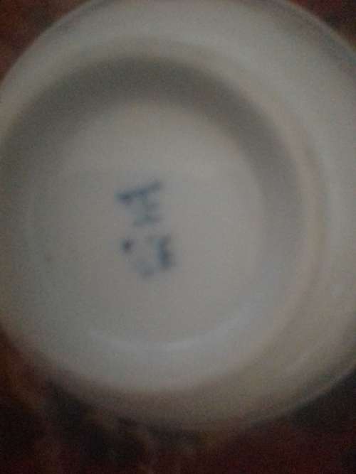 11 of 6 cm porcelain  bowls and 11 rice spoons