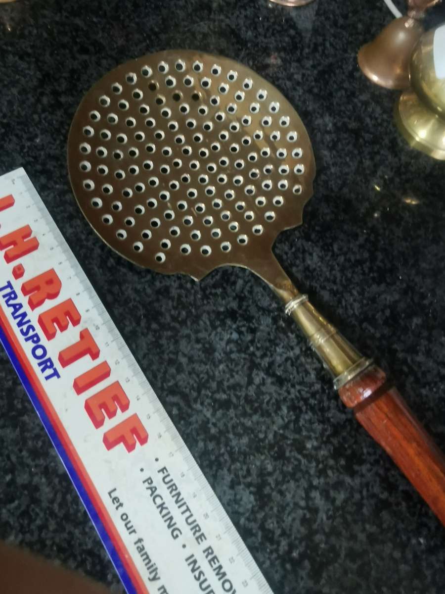Vintage long brass kitchen utensil