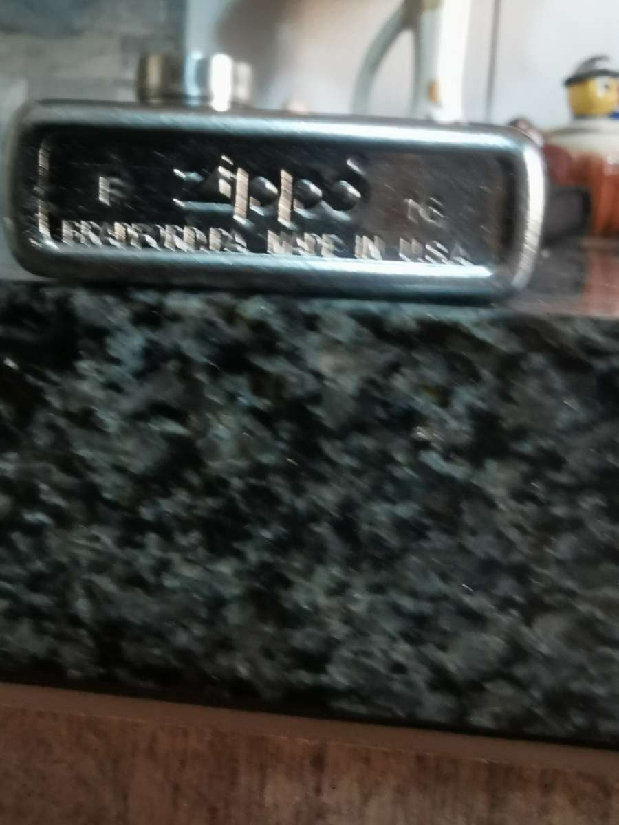 VINTAGE ZIPPO BRADFORD MADE IN ENGLAND