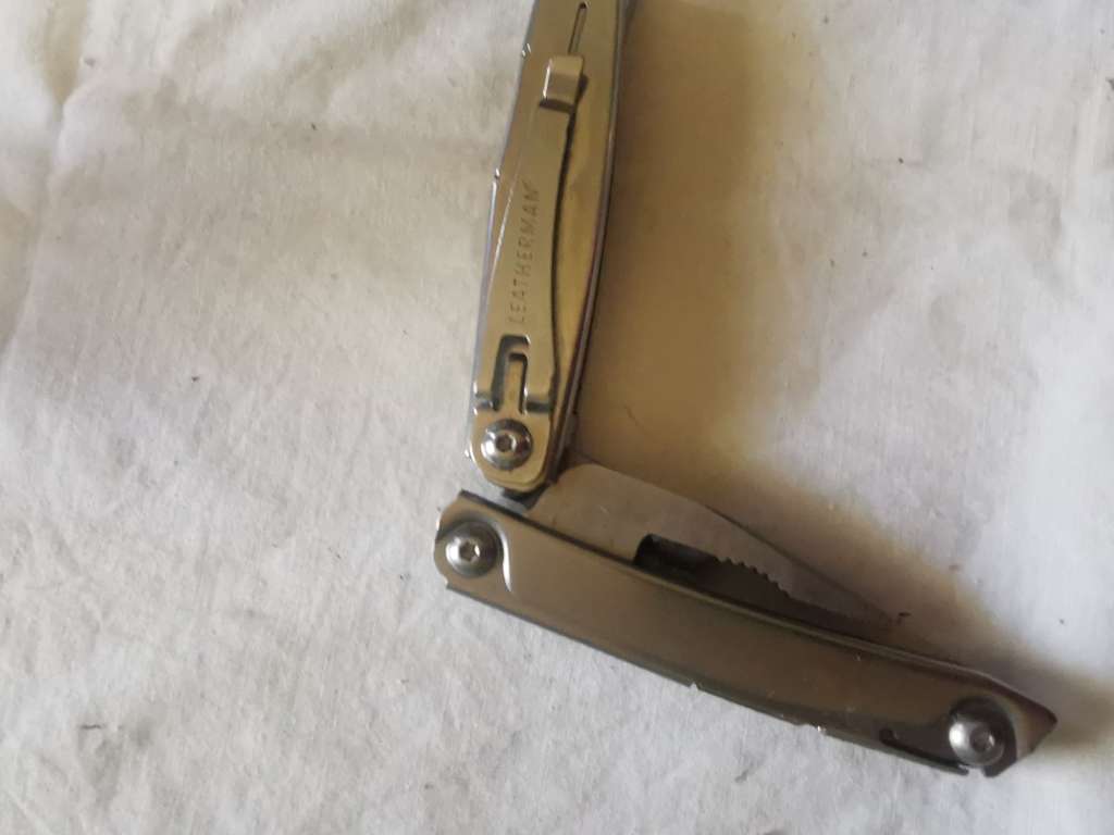 GENUINE LEATHERMAN REV MULTITOOL