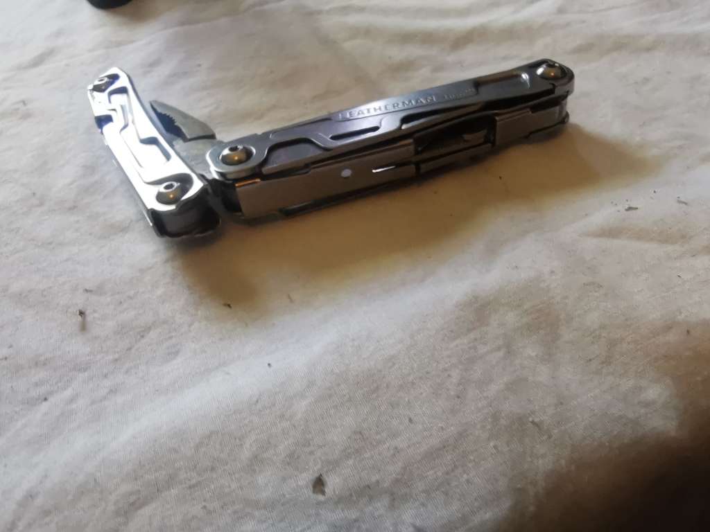 GENUINE LEATHERMAN REV MULTITOOL