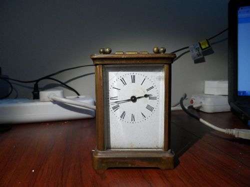 carriage clock. with case