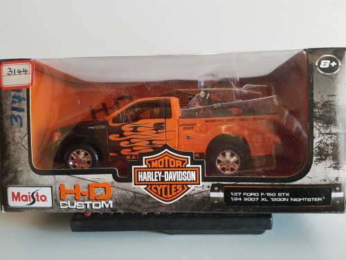 Ford F-150 STX with 2007 XL 1200N Nightster