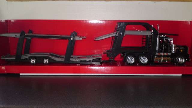 Auction: Kenworth W900 Auto Carrier Truck (1) (Scale 1/43) By NewRay