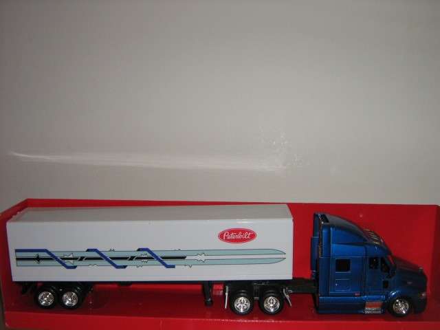 Auction: Peterbilt 387 Cargo Hauler Truck (4) (Scale 1/43) By NewRay