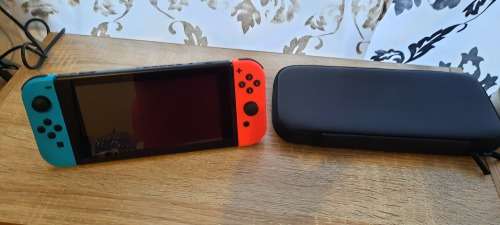 Nintendo Switch Console Gen 1 Neon Blue Red and Carry Case and Original Accessories