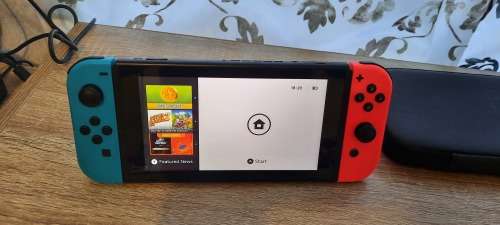 Nintendo Switch Console Gen 1 Neon Blue Red and Carry Case and Original Accessories