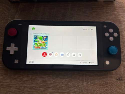 Nintendo Switch Lite + 1 Game + Accessories