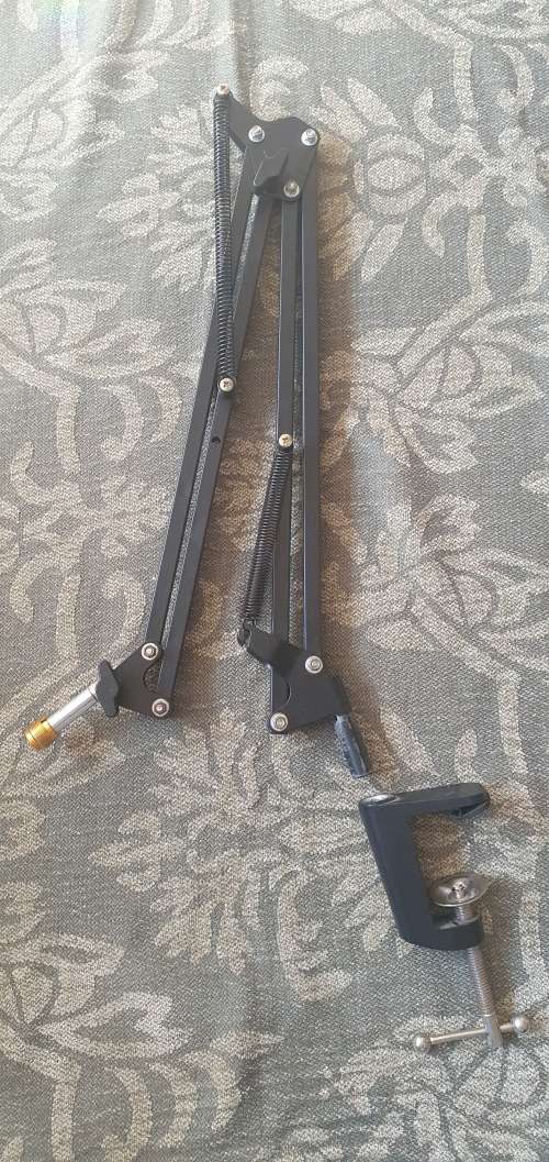 Microphone pop filter and foldable desk mount microphone stand