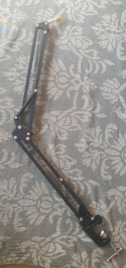 Microphone pop filter and foldable desk mount microphone stand