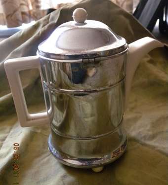 Art Deco Coffee pot 1940's. Chrome and pottery. Perfect condition..