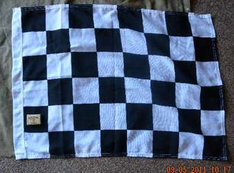 Genuine cloth full size chequered flag.