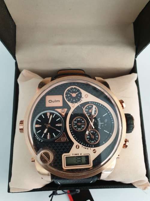 QUALM WATCH DESIGNER