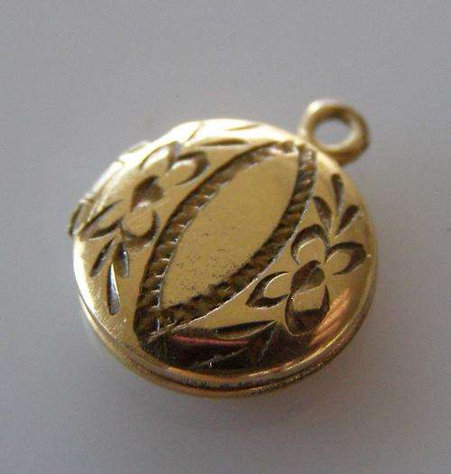 14 KT SOLID GOLD LOCKET