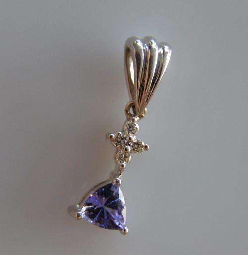 18 CARAT WHITE GOLD - DIAMOND AND TANZANITE - PENDANT