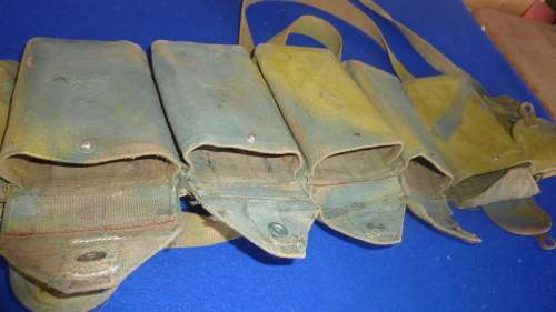 4) A RHODESIAN HAND PAINTED CAMO 7.62 AMMO CHEST RIG-MODIFIED FROM A CHINESE PATT63-USED SOLDIER RLI