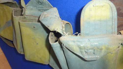 4) A RHODESIAN HAND PAINTED CAMO 7.62 AMMO CHEST RIG-MODIFIED FROM A CHINESE PATT63-USED SOLDIER RLI