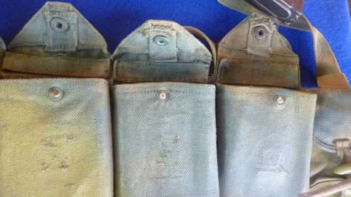 4) A RHODESIAN HAND PAINTED CAMO 7.62 AMMO CHEST RIG-MODIFIED FROM A CHINESE PATT63-USED SOLDIER RLI