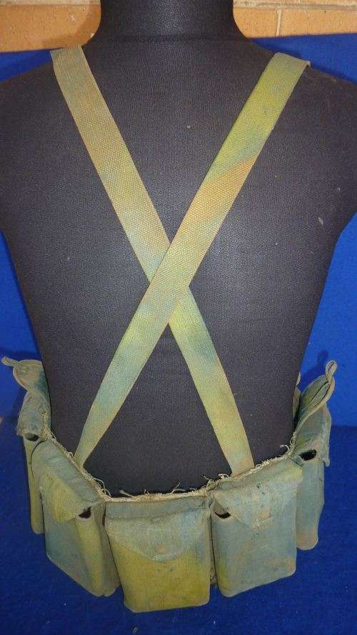 4) A RHODESIAN HAND PAINTED CAMO 7.62 AMMO CHEST RIG-MODIFIED FROM A CHINESE PATT63-USED SOLDIER RLI