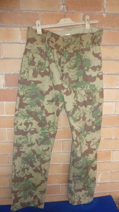 6) A PAIIR OF ORIGINAL KOEVOET CAMO TROUSER WITH CAMO BUTTONS-MEDIUM-GOOD CONDITION-LOW START!