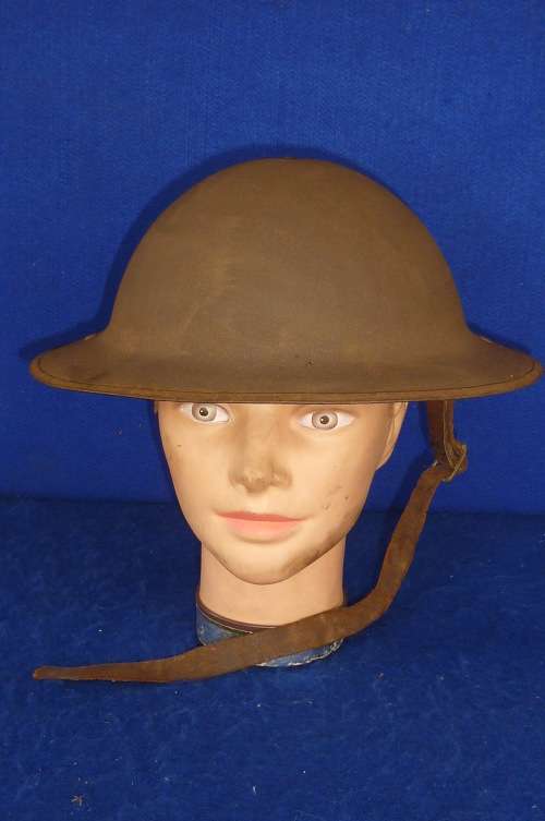 WW1-BRITISH BRODIE HELMET WITH LIP-LEATHER CHIN STRAP DAMAGE-BUT OTHERWISE GOOD CONDITION-LOW START!