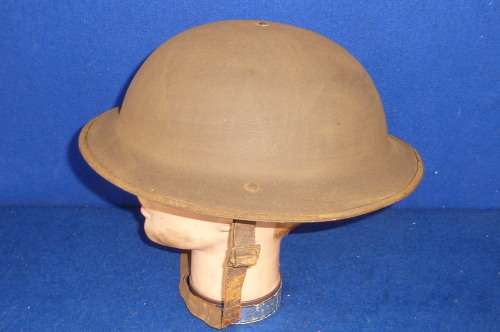 WW1-BRITISH BRODIE HELMET WITH LIP-LEATHER CHIN STRAP DAMAGE-BUT OTHERWISE GOOD CONDITION-LOW START!