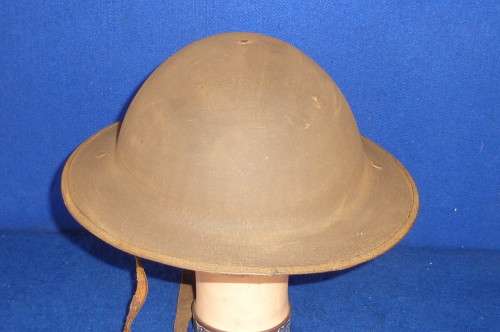 WW1-BRITISH BRODIE HELMET WITH LIP-LEATHER CHIN STRAP DAMAGE-BUT OTHERWISE GOOD CONDITION-LOW START!