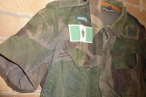 1)RHODESIAN BUSH JACKET-CUT TO PREFERENCE-SHORT SLEEVE`S and DYED DARKER-MEDIUM IN SIZE-LOW START!
