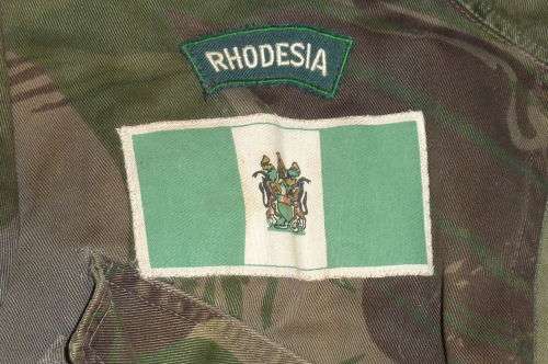 1)RHODESIAN BUSH JACKET-CUT TO PREFERENCE-SHORT SLEEVE`S and DYED DARKER-MEDIUM IN SIZE-LOW START!