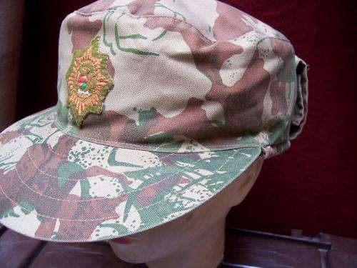 S.A.P-KOEVOET-CAMO CAP-WITH NECK & EAR FLAP'S-ORANGE ON INSIDE.