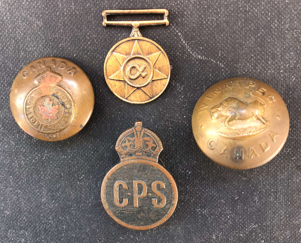 SADF MINIATURE MEDAL, TWO CANADIAN MILITARY BUTTONS AND CPS BUTTONHOLE BADGE